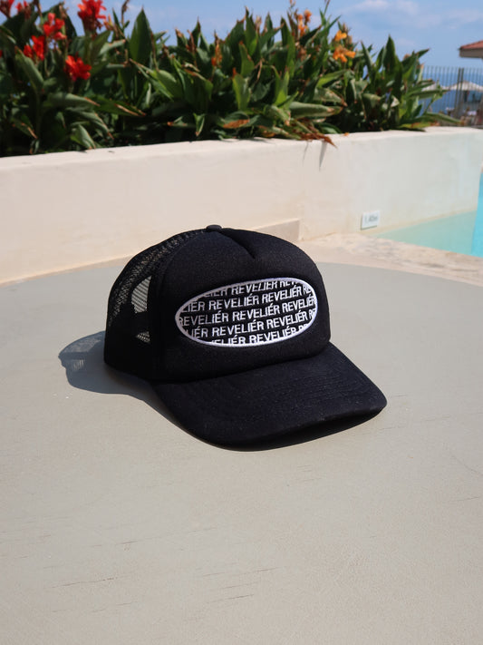 REPEAT LOGO TRUCKER HAT - BLACK